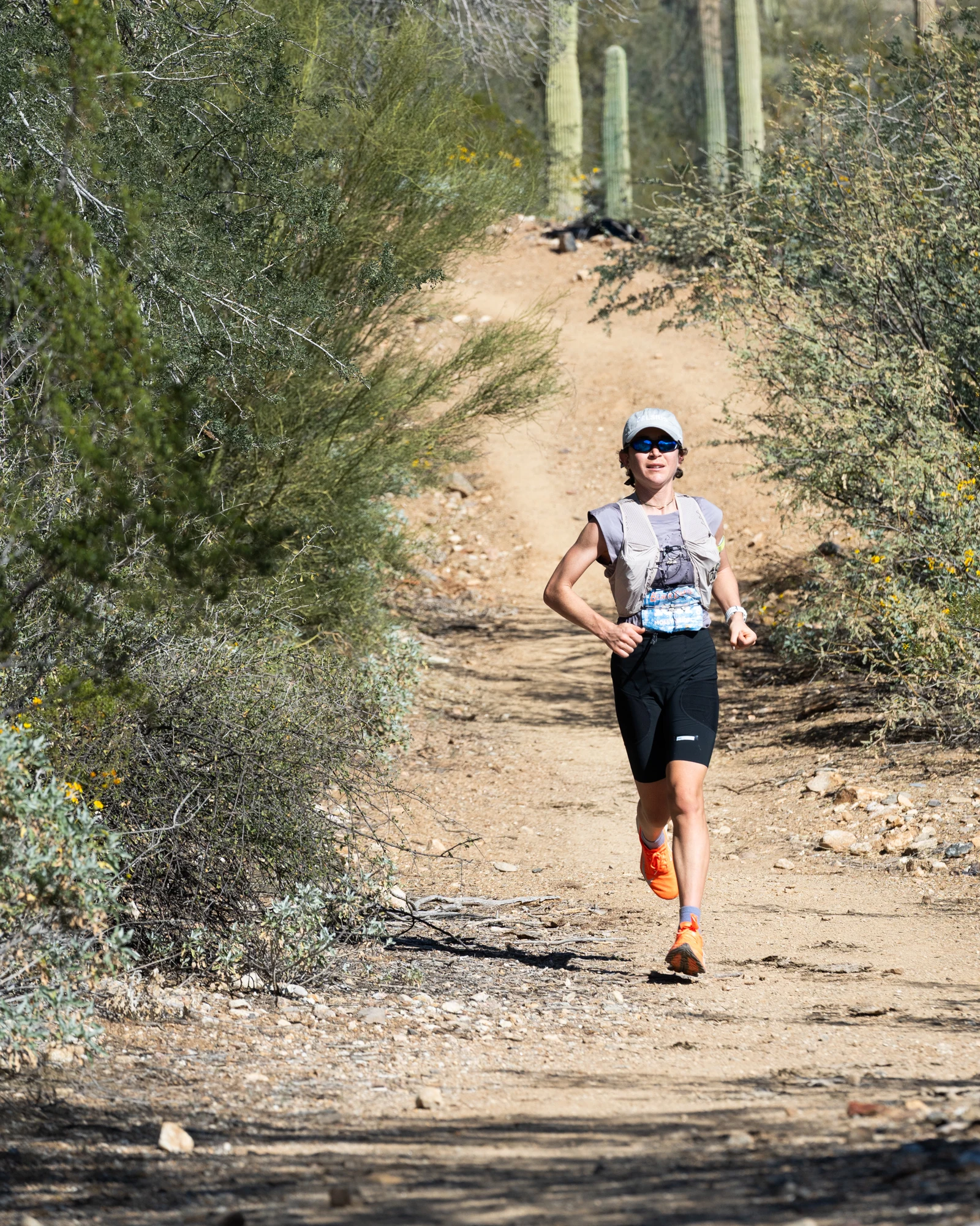 Molly Seidel runs alone on a desert trail during Black Canyon 100K.