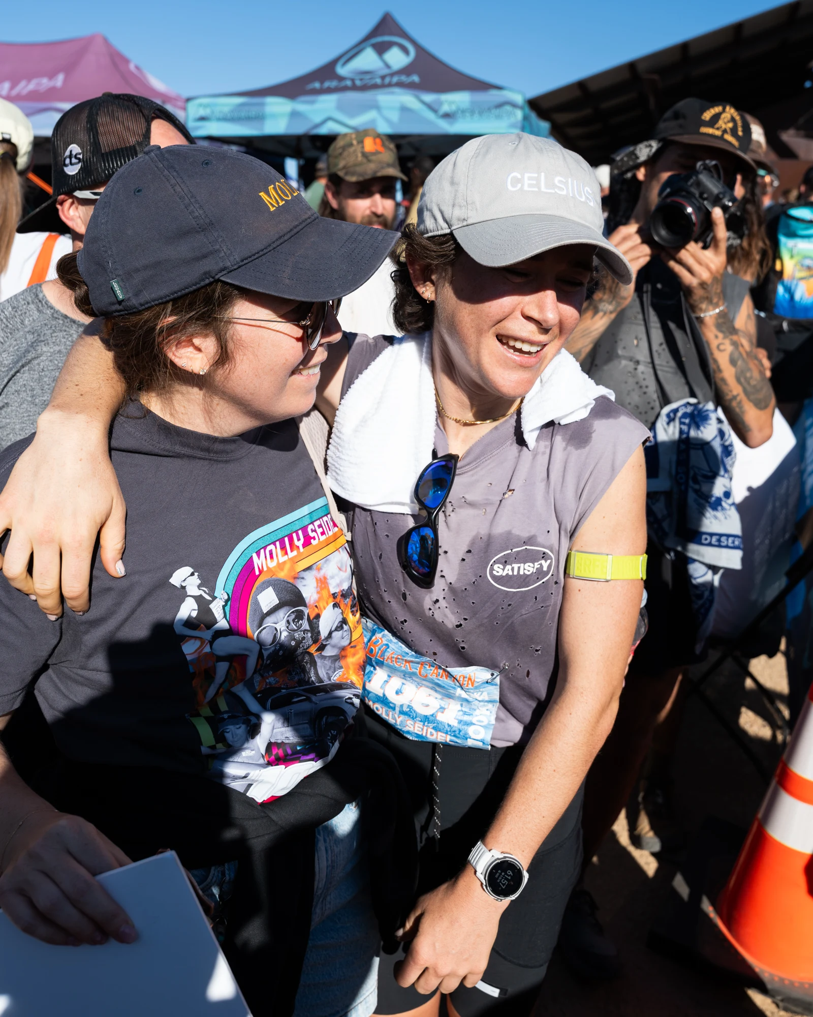 Molly Seidel smiles with a supporter after Black Canyon 100K.