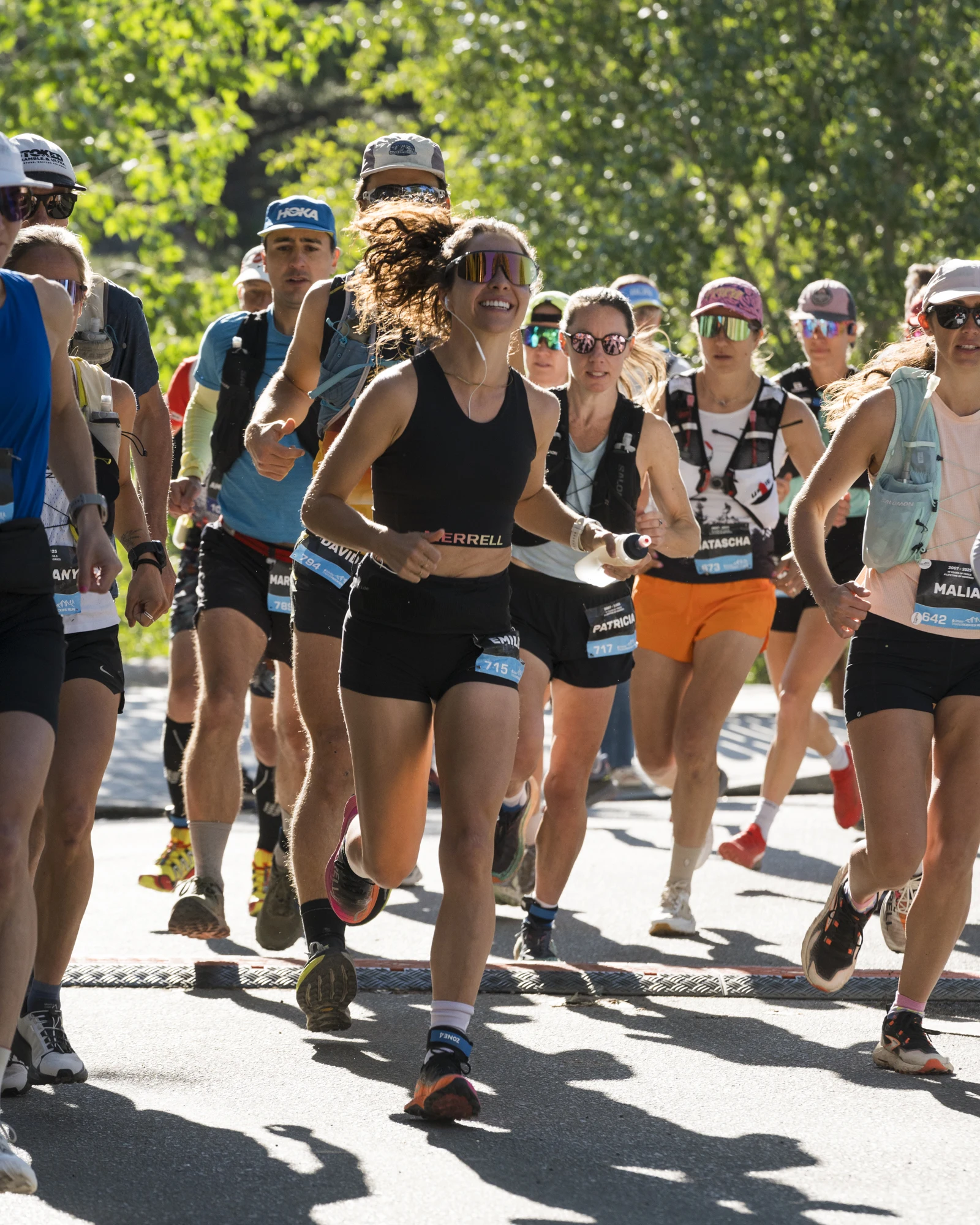 A group of runners sets out together at the start of a TransRockies stage.