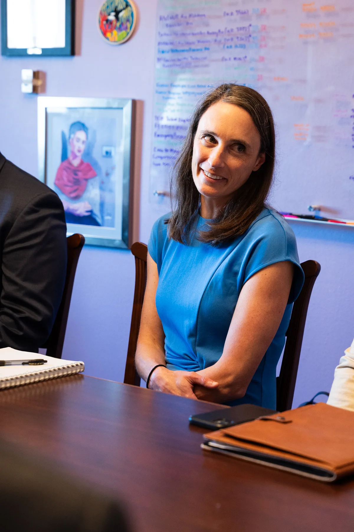 An advocate listens during a congressional office meeting.