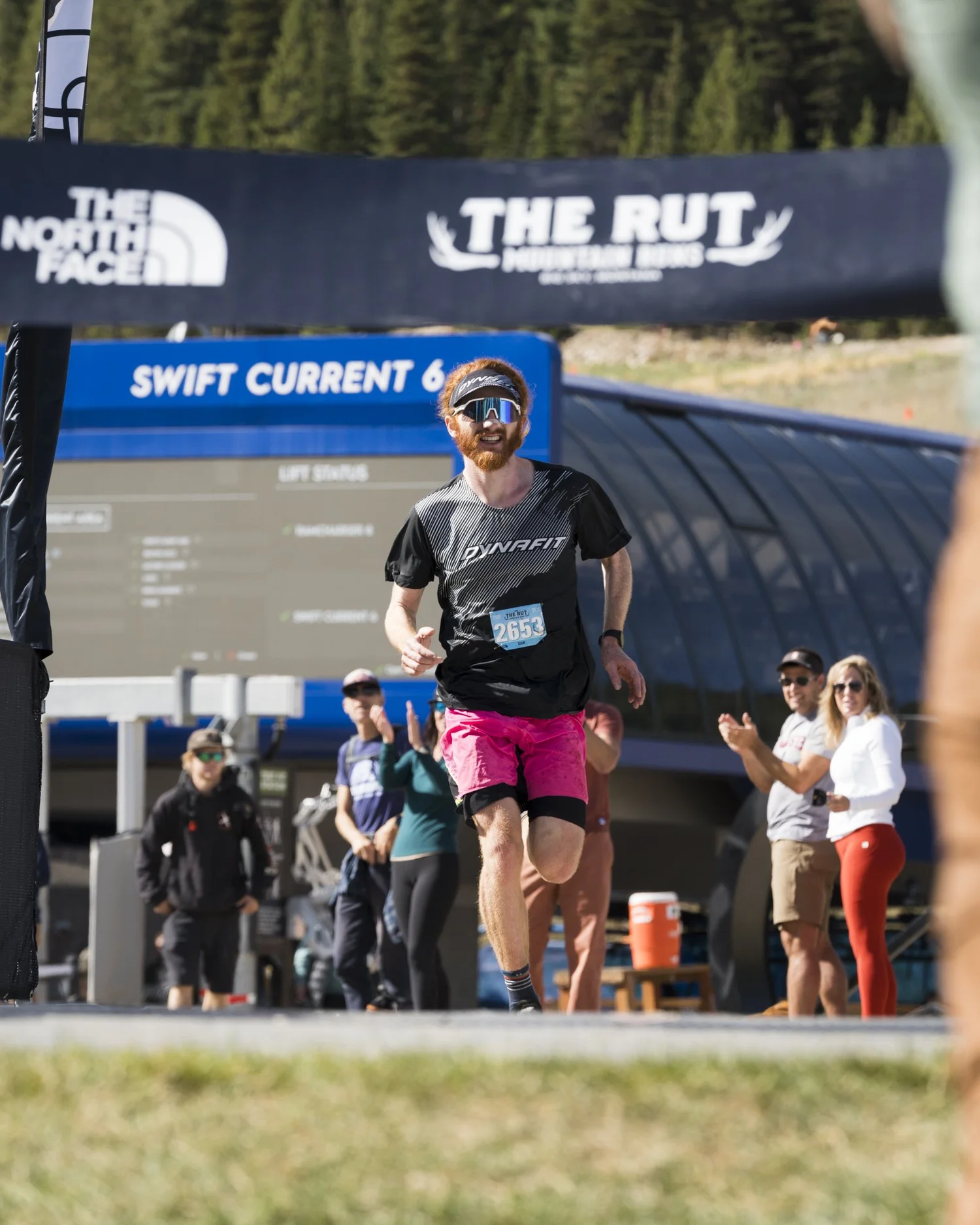 A runner approaches the finish at The RUT Mountain Runs in Big Sky.